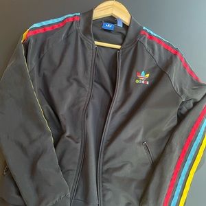 Adidas jacket with zipper.  Women's medium.